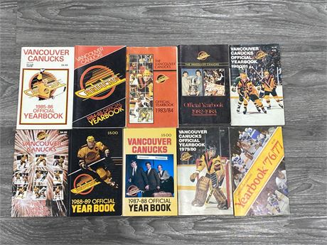 LOT OF CANUCKS YEARBOOKS