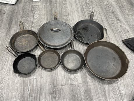 7 CAST IRON PANS + 1 CAST IRON LID