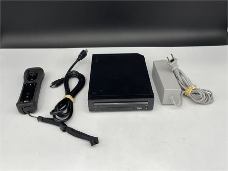 BLACK WII CONSOLE W/ CORDS & CONTROLLER (Turns on)