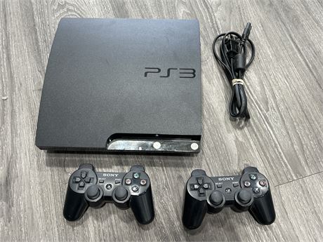 PS3 CONSOLE W/CONTROLLERS & CORDS