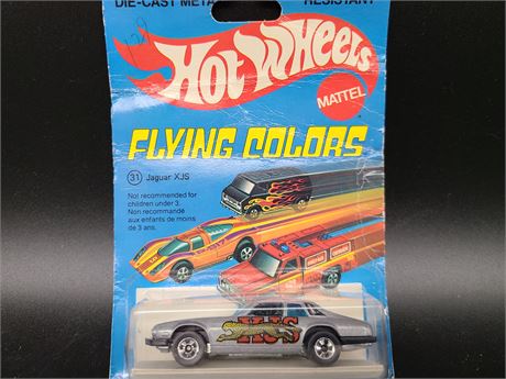 (1977) VINTAGE HOTWHEELS FLYING COLOR JAGUAR XJS (New in pack)