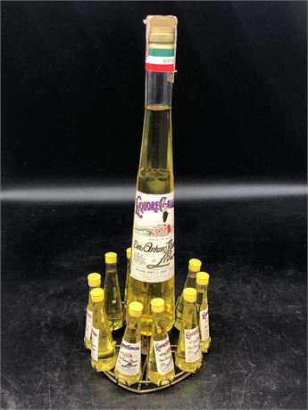 SEALED VINTAGE 1960s GALLIANO LIQUER BOTTLE WITH 10 MINI BOTTLES ON STAND (RARE)