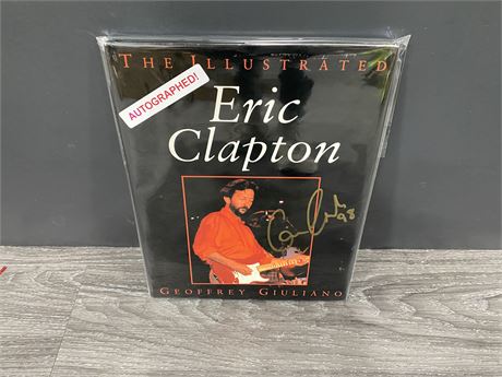 SIGNED ERIC CLAPTON BOOK WITH COA