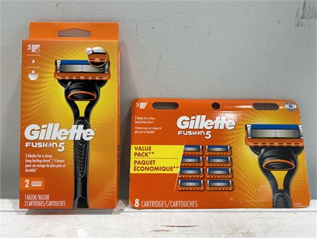 NEW GILLETTE FUSION 5 W/BOX OF EXTRA CARTRIDGES