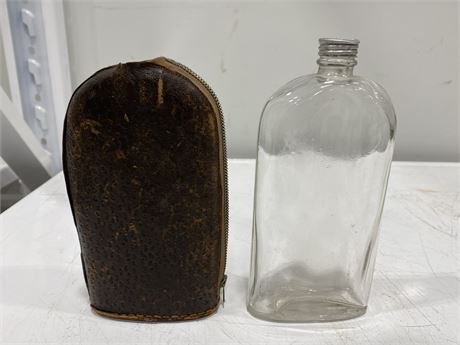 VINTAGE BOTTLE IN LEATHER CASE (7.5” tall)