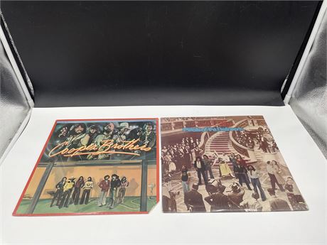2 SEALED COOPER BROTHERS RECORDS - BOTH HAVE CUTS IN BOTTOM RIGHT CORNER