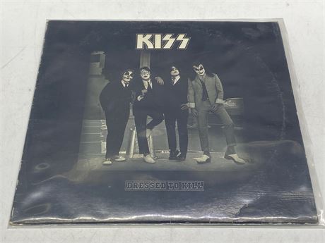 KISS - DRESSED TO KILL - VG (slightly scratched)