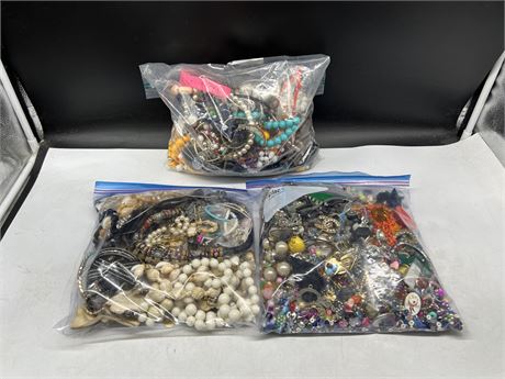 3 LARGE BAGS OF COSTUME JEWELRY