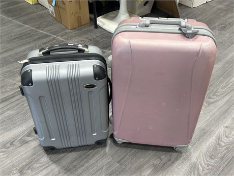 2 HARD SHELL SUITCASES - USED CONDITION