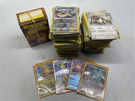 LOT OF POKÉMON CARDS WITH DRAGON SHIELD PROTECTIVE SLEEVES