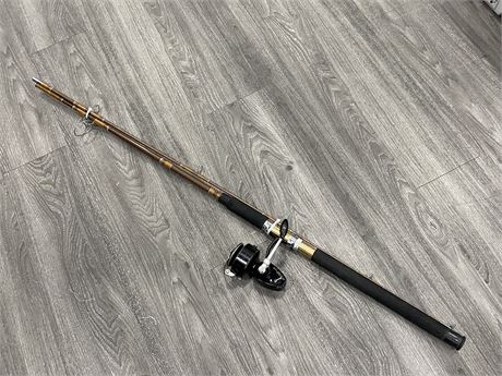 8’ SPINNING ROD WITH A REBUILT MITCHELL 306 REEL