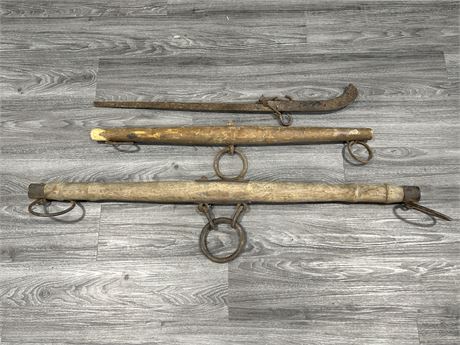 ANTIQUE PAIR OF CLYDESDALE HORSE WOODEN CAST IRON YOKES - LARGEST IS 47”