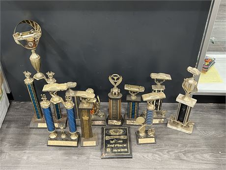 STUNT CAR DRIVERS PERSONAL COLLECTION OF TROPHIES FROM PNE, AGRIFAIR, ECT