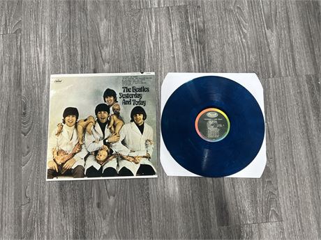 REPRODUCTION “THE BEATLES” BUTCHER ALBUM ON BLUE VINYL - VG / (FAIRLY SCRATCHED)