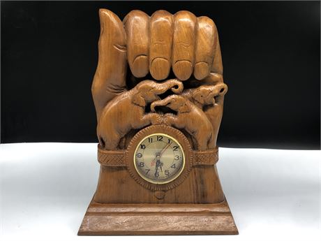 WOOD CARVING HAND HOLDING ELEPHANTS CLOCK 14” TALL