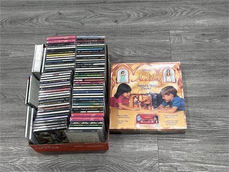 FLAT OF ASSORTED CDS (SOME SEALED) + NEW ALADDIN CASSETTE SET