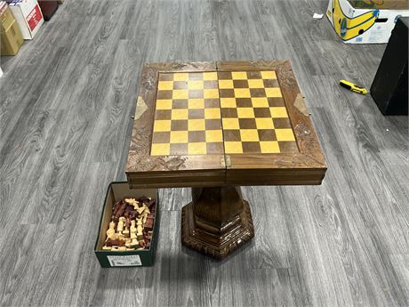 VINTAGE CHESS BOARD ON STAND W/ CARVED WOODEN PIECES