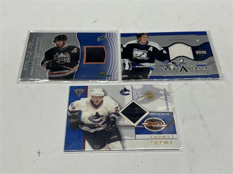 3 NHL JERSEY CARDS - SEDIN, JAGR, LECAVALIER