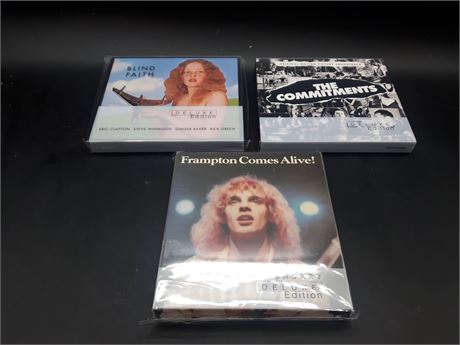 COLLECTION OF 3 DELUXE EDITION MUSIC CDS - MINT CONDITION
