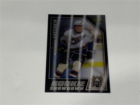 2006 UD ROOKIE SHOWDOWN HOLOGRAPHIC CROSBY/OVECHKIN CARD (White lines are glare)