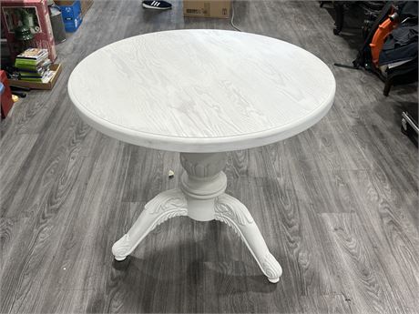HEAVY WOOD BISTRO TABLE (29” tall, 34” wide)