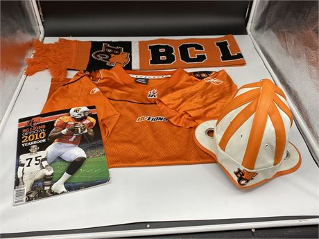 BC LIONS FAUX LEATHER HELMET HEAD CAP, JERSEY, SCARF AND BOOK